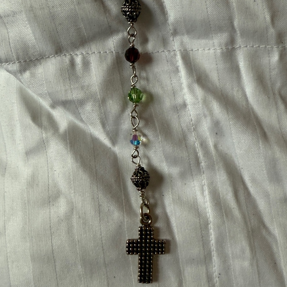 Rosary beads -hand beaded by designer.  Multi color w/ cross & blessed mother.